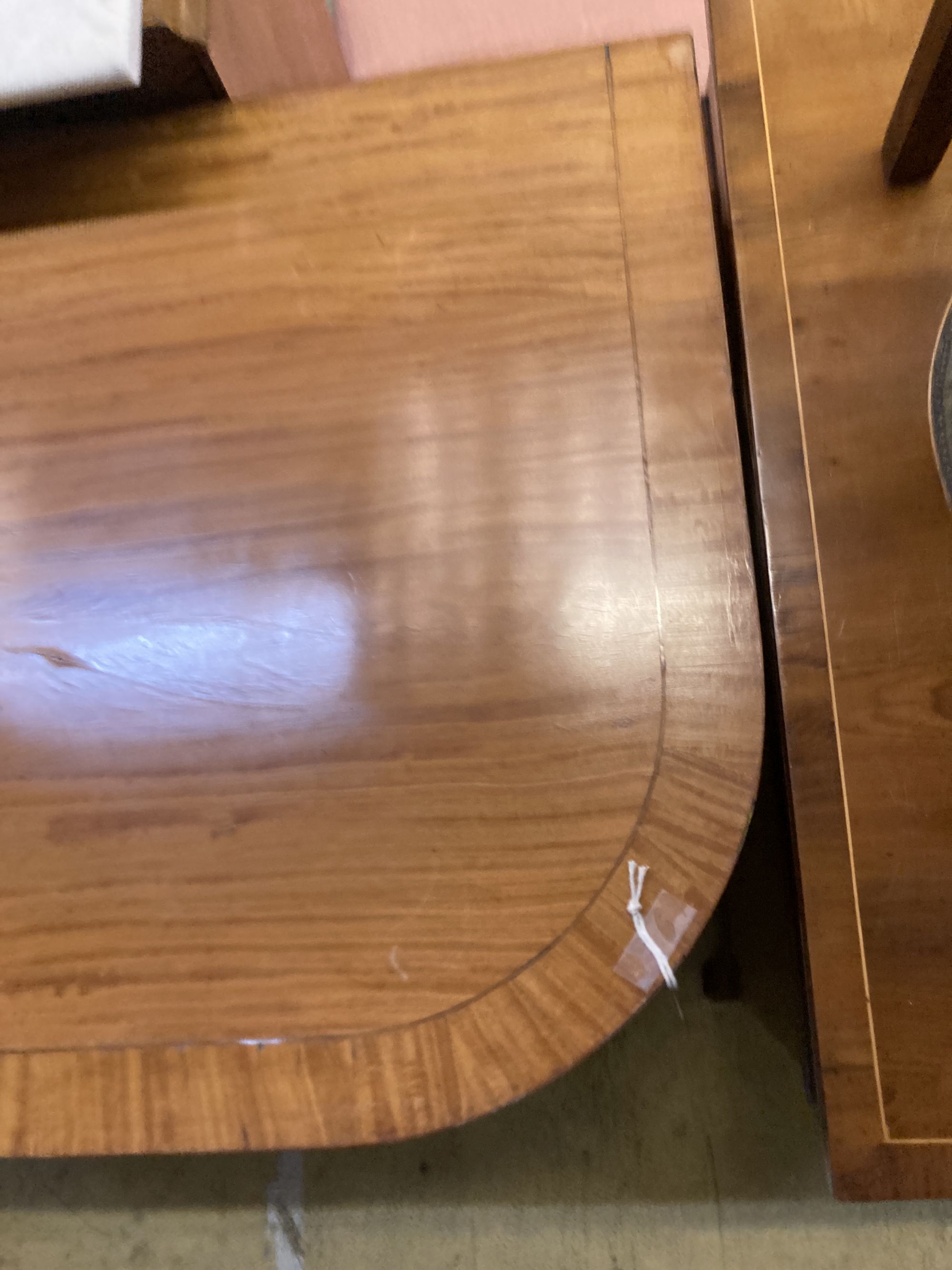 A Sheraton revival D end dining table, width 106cm, depth 60cm, height 75cm